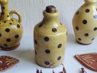 Small Redware Bottle with Black Dots