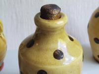 Small Redware Bottle with Black Dots