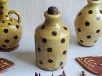 Small Redware Bottle with Black Dots