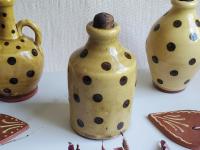 Small Redware Bottle with Black Dots