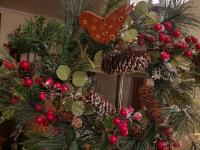 Snowy Pine Wreath with Red Berries and Redware Bird Ornament