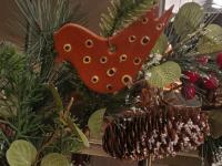 Snowy Pine Wreath with Red Berries and Redware Bird Ornament