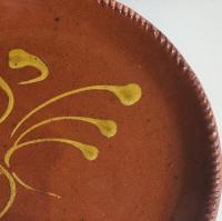 Redware 9 in. Plate with "Feather" Golden Slip Motif, Food Safe, Antiqued