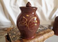 Redware 5 in Storage Jar with Feather Pattern and Acorn Finial