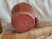 Redware 5 in Storage Jar with Feather Pattern and Acorn Finial