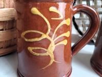 Two Slip-Decorated Redware Mugs with Feather Motif (a)