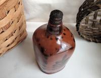 Redware Bottle and Stopper with Black Floral Motif and Square Bottom