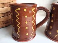 Two Slip-Decorated Redware Mugs with Squiggles and Dots Pattern (a)