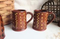 Two Slip-Decorated Redware Mugs with Squiggles and Dots Pattern (a)