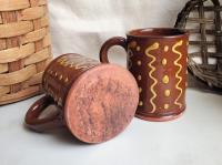 Two Slip-Decorated Redware Mugs with Squiggles and Dots Pattern (a)