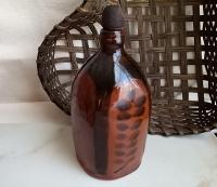 Redware Bottle and Stopper with Black Motif and Square Bottom