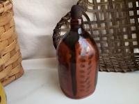 Redware Bottle and Stopper with Black Motif and Square Bottom