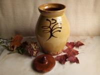 Redware 10 in Jar with Black Slip Feather Decoration