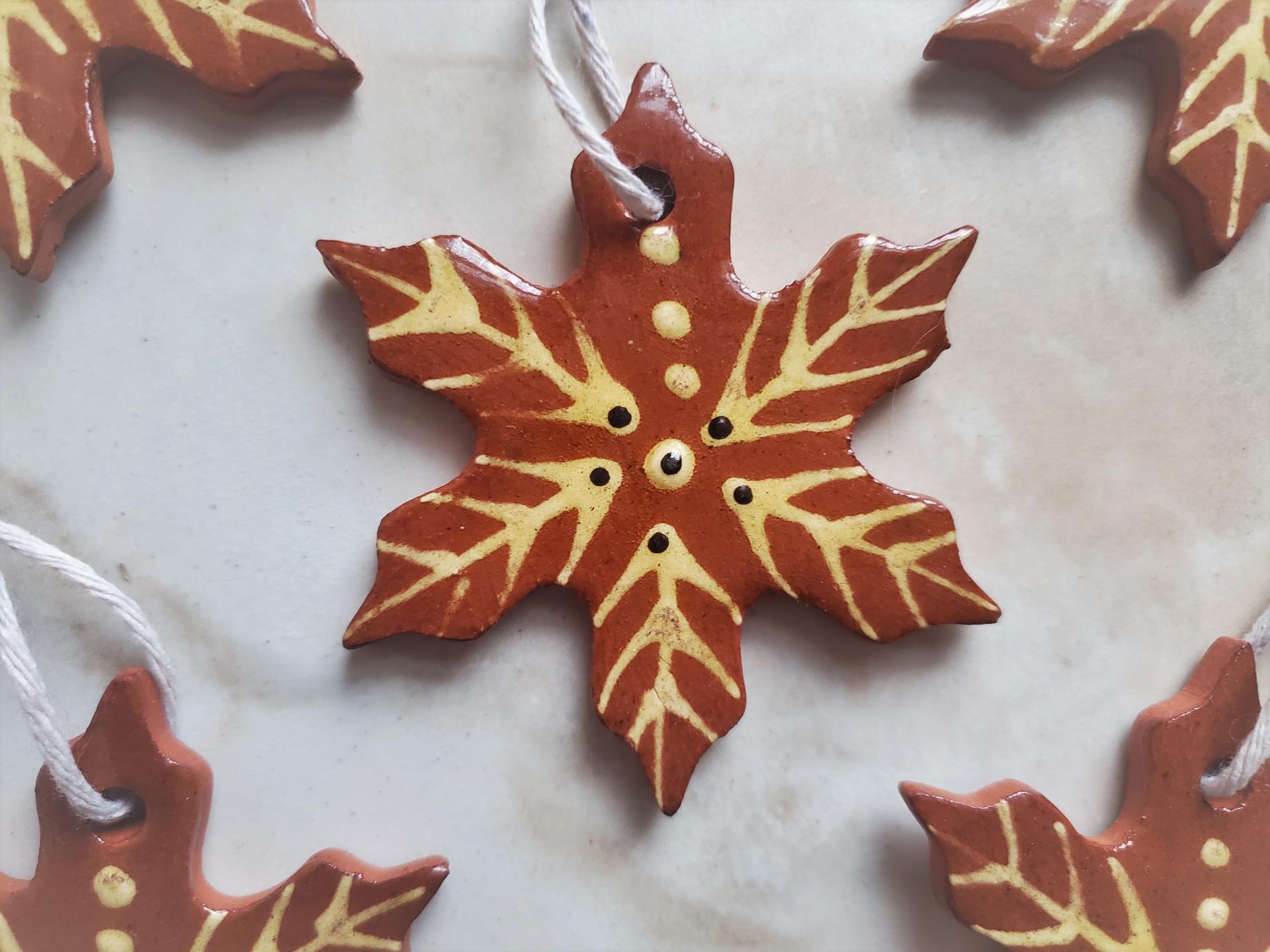 Redware Snowflake with Slip Decoration