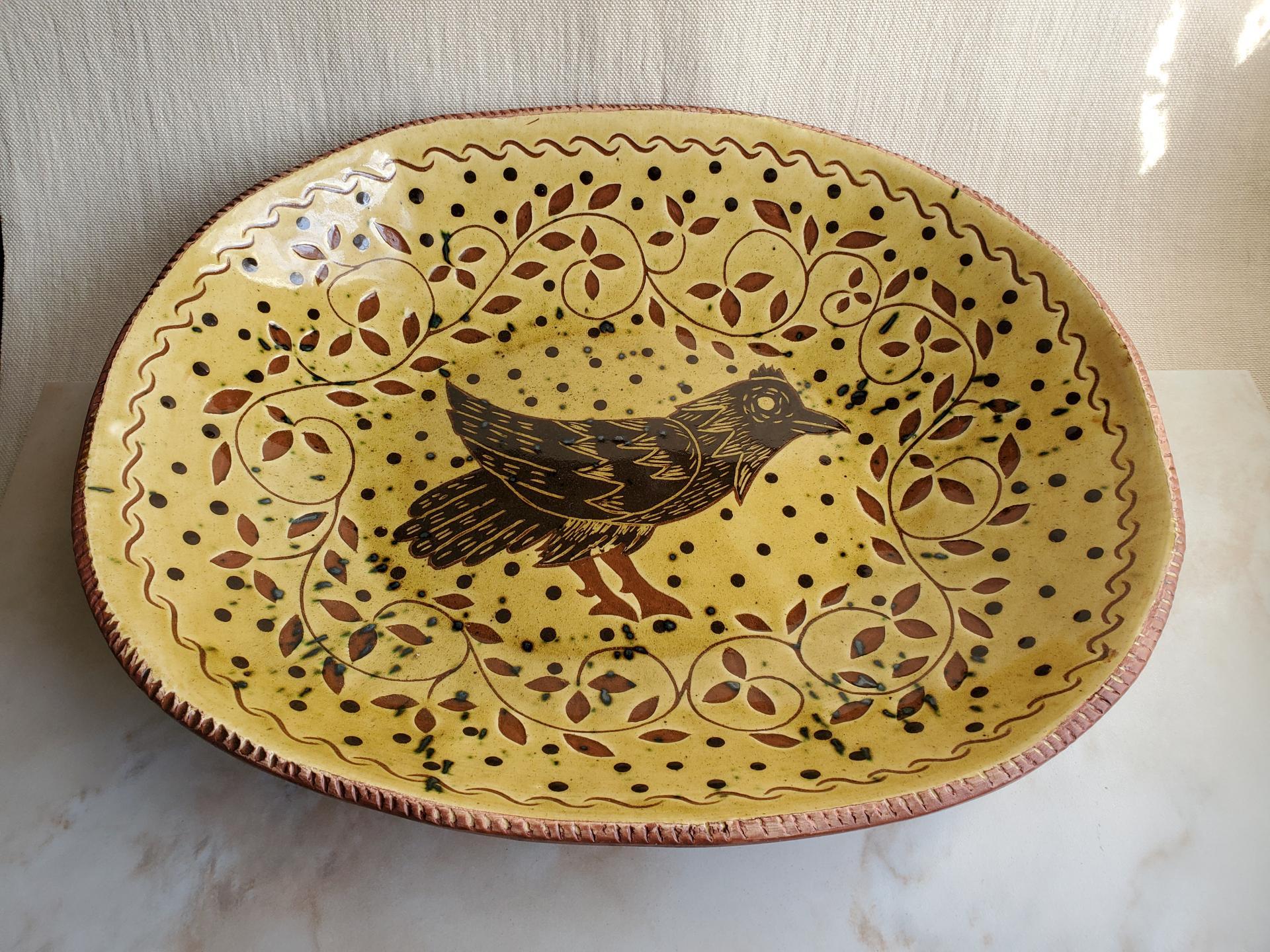 Redware Deep Trencher with Black Bird Motif