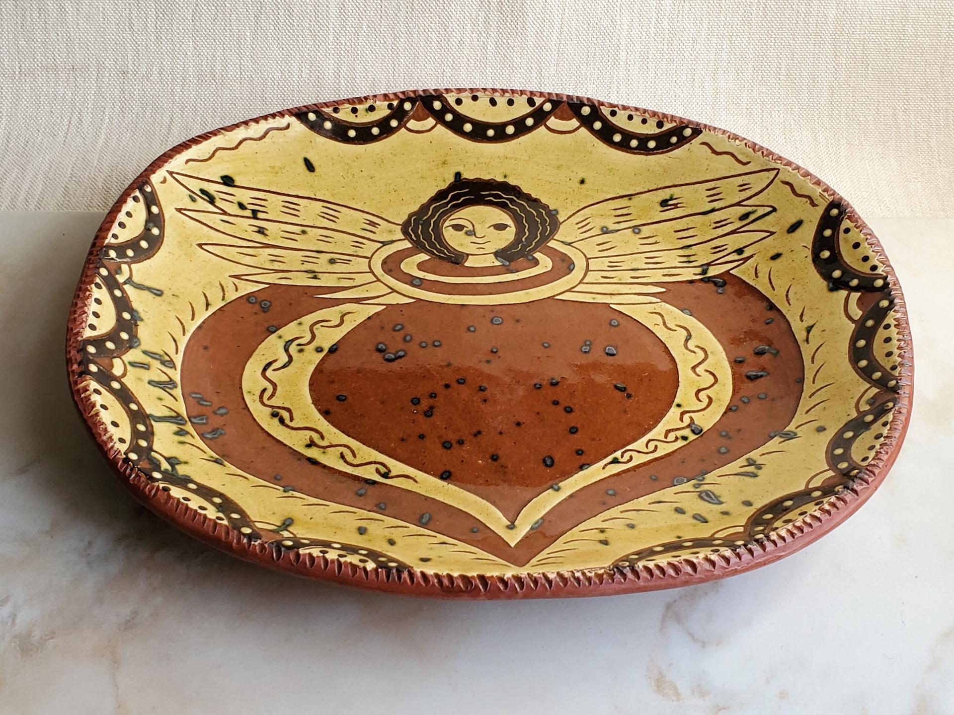 Redware Shallow Trencher, Angel with Wings Motif