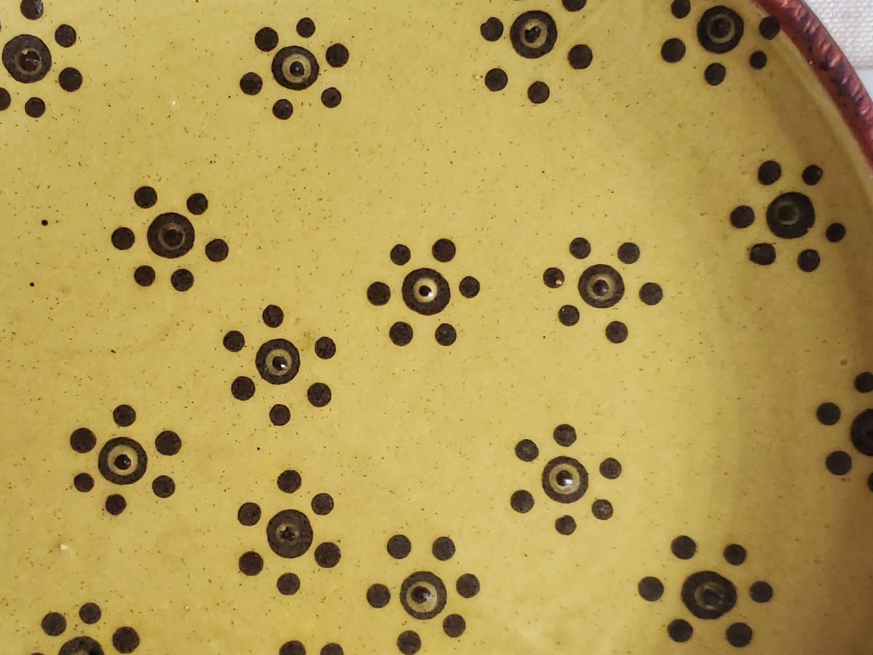 Redware 11 in Plate with Black and White Dots Pattern