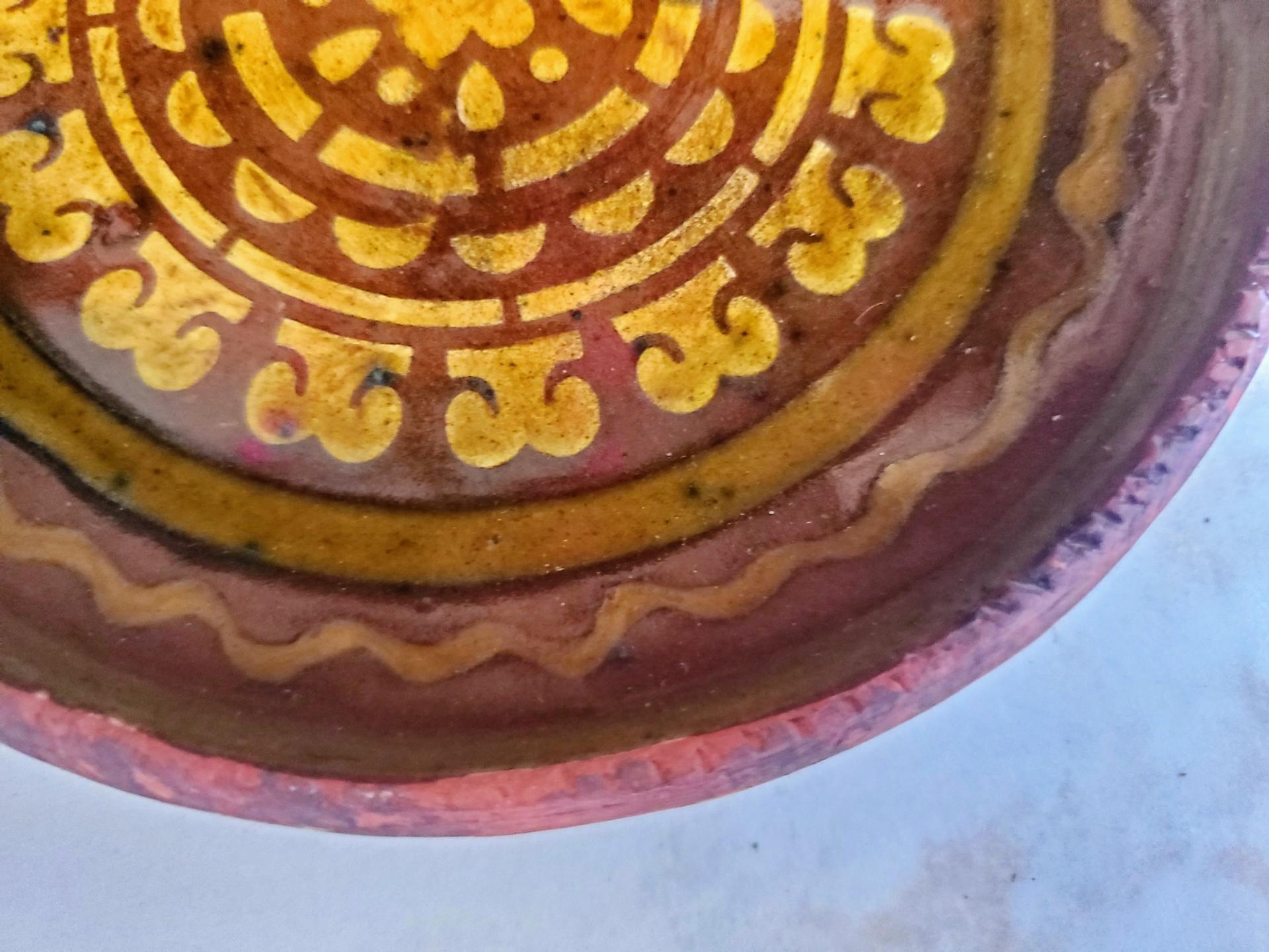 Redware 7 in. Plate with Green and Golden Slip Decoration