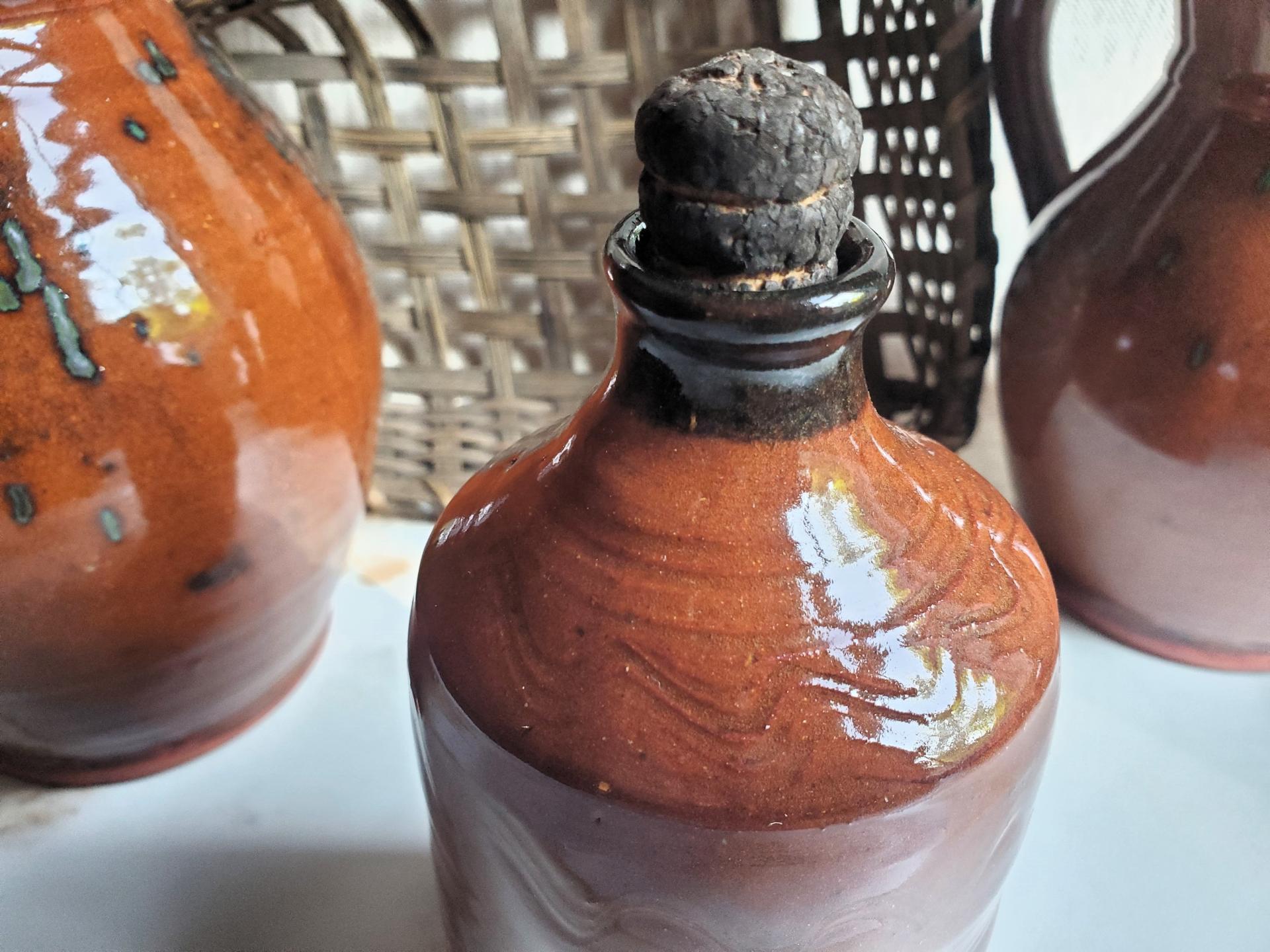 Antiqued Redware Bottle and Stopper, Wheel-Thrown with Incised Pattern