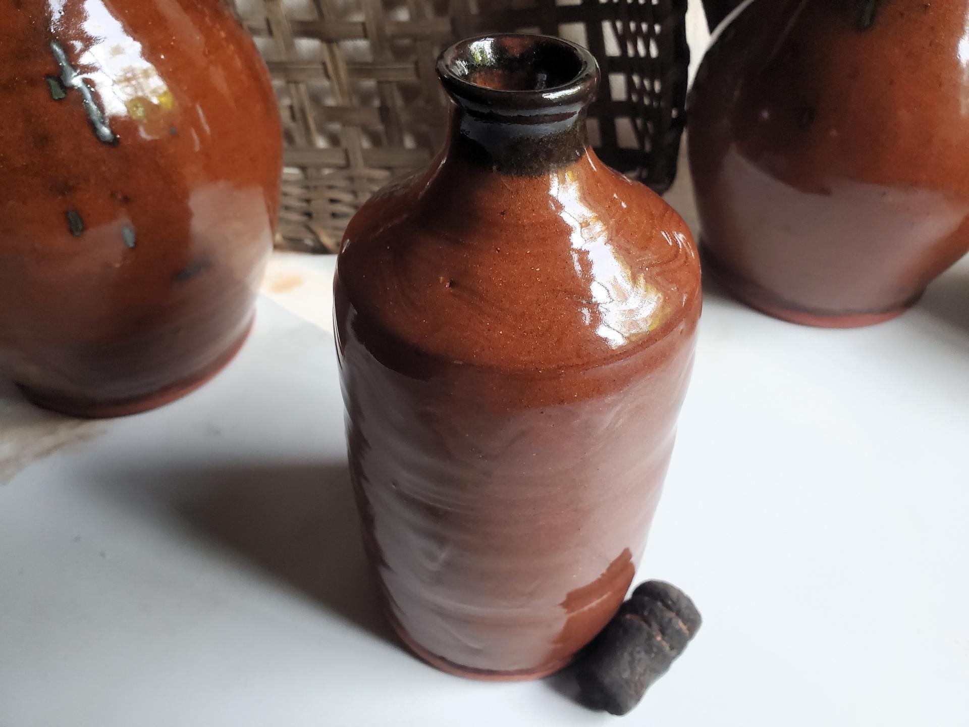 Antiqued Redware Bottle and Stopper, Wheel-Thrown with Incised Pattern