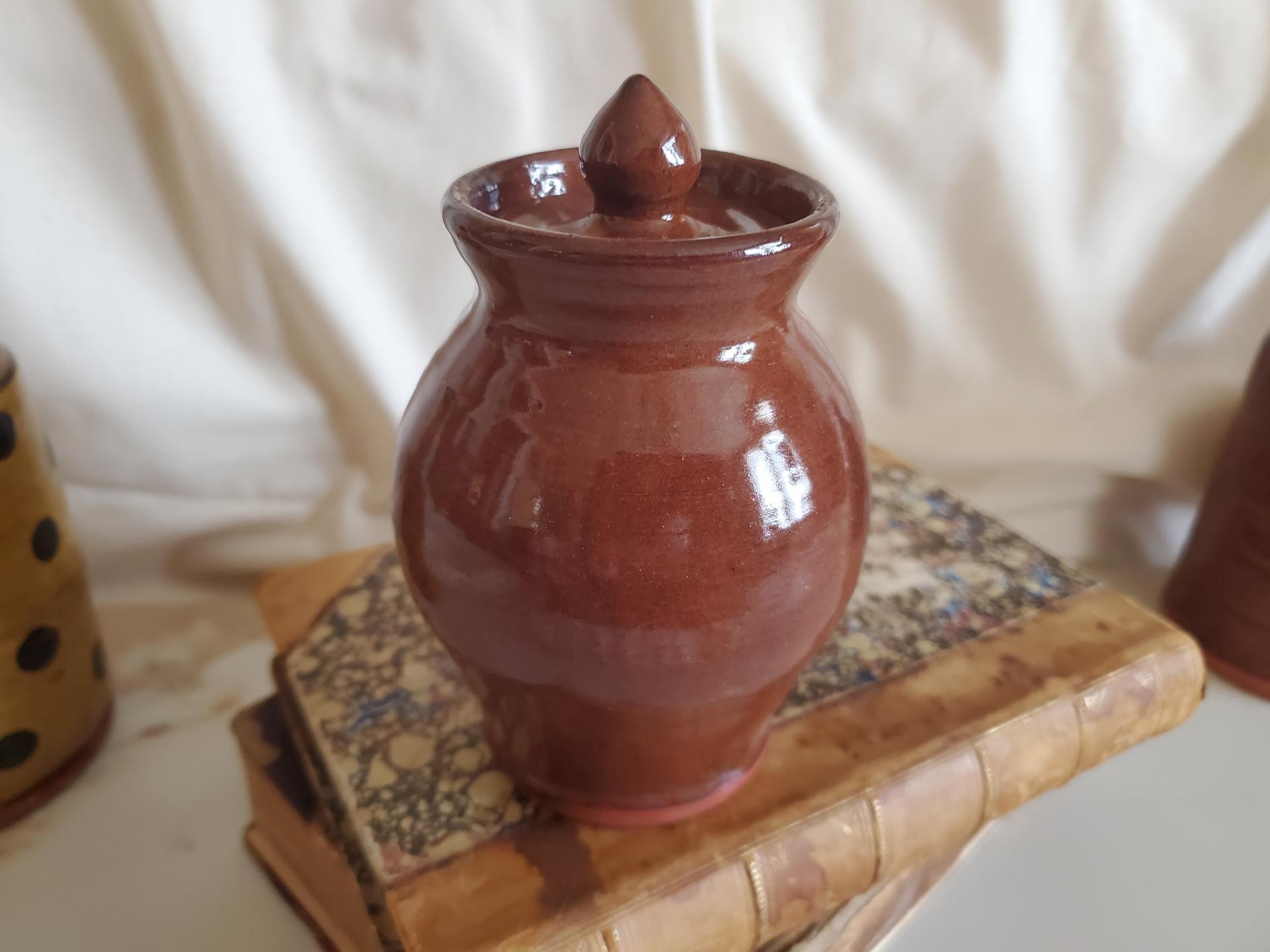 Redware 5 in Storage Jar with Feather Pattern and Acorn Finial
