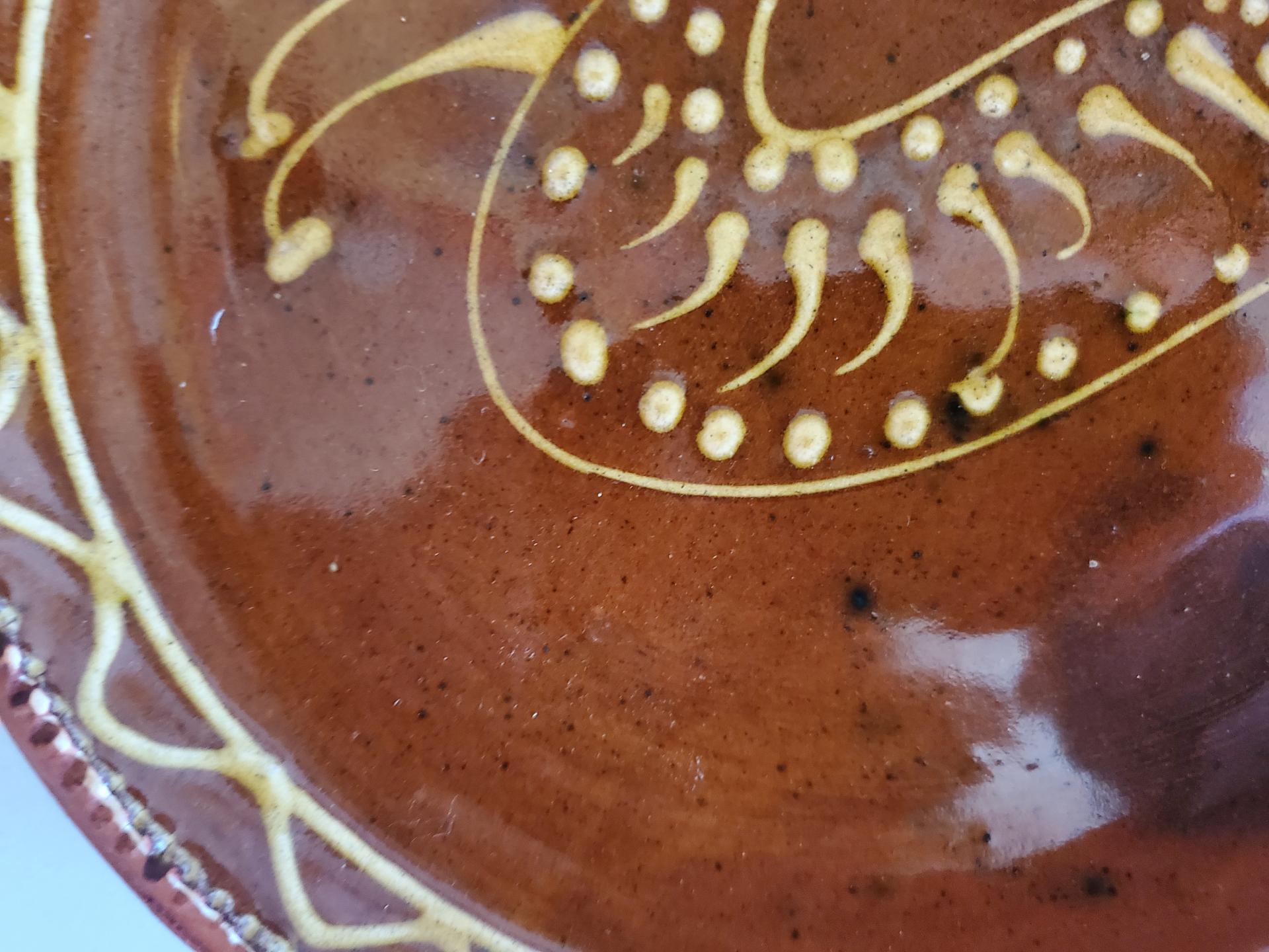 Redware 9 in. Plate with Rabbit Pattern, Antiqued