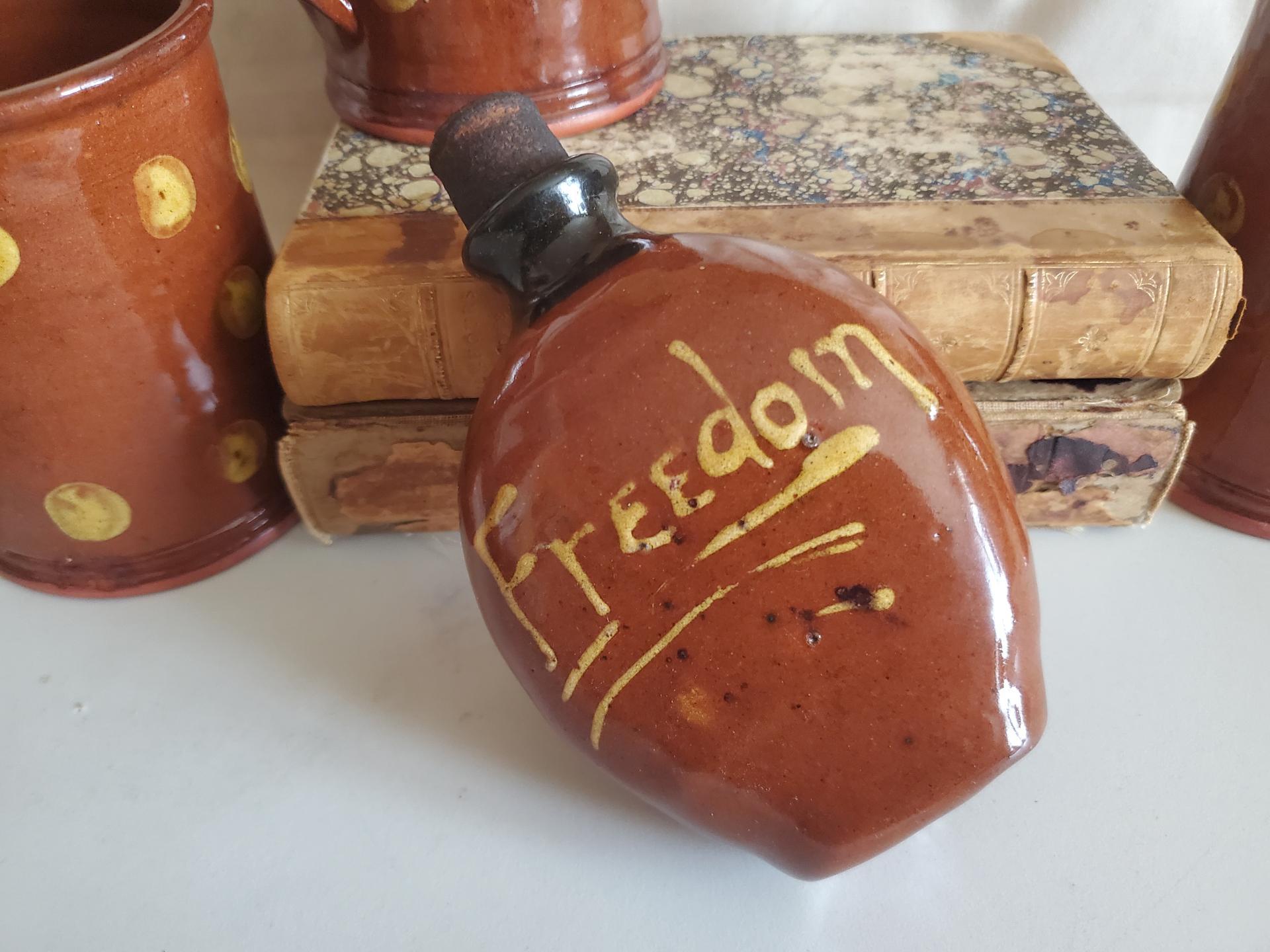 Redware Flask, Black Neck and Slipware Words