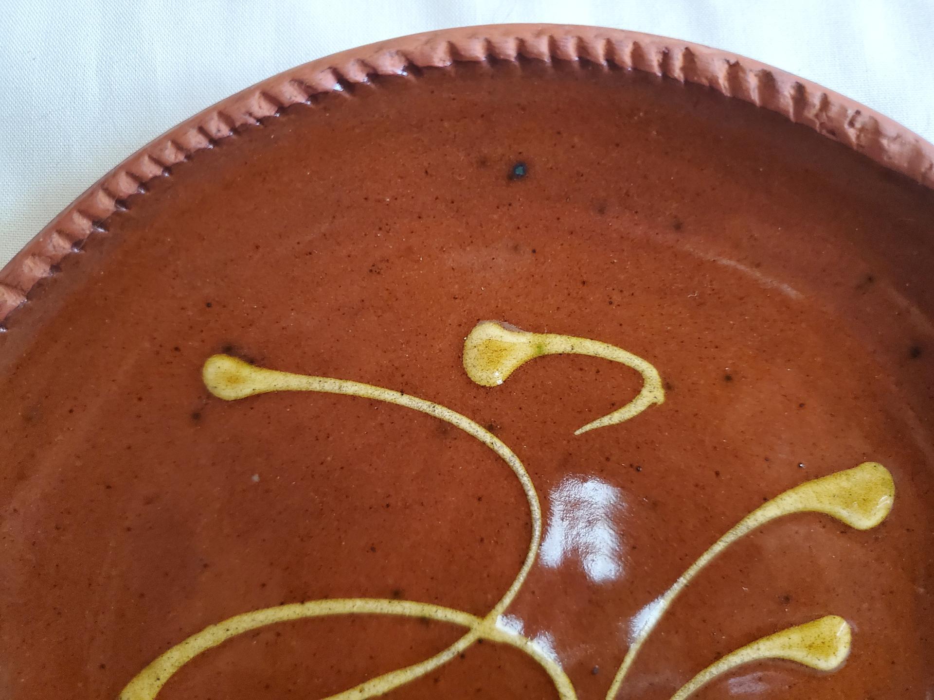 Redware 9 in. Plate, Feather Motif, Antiqued