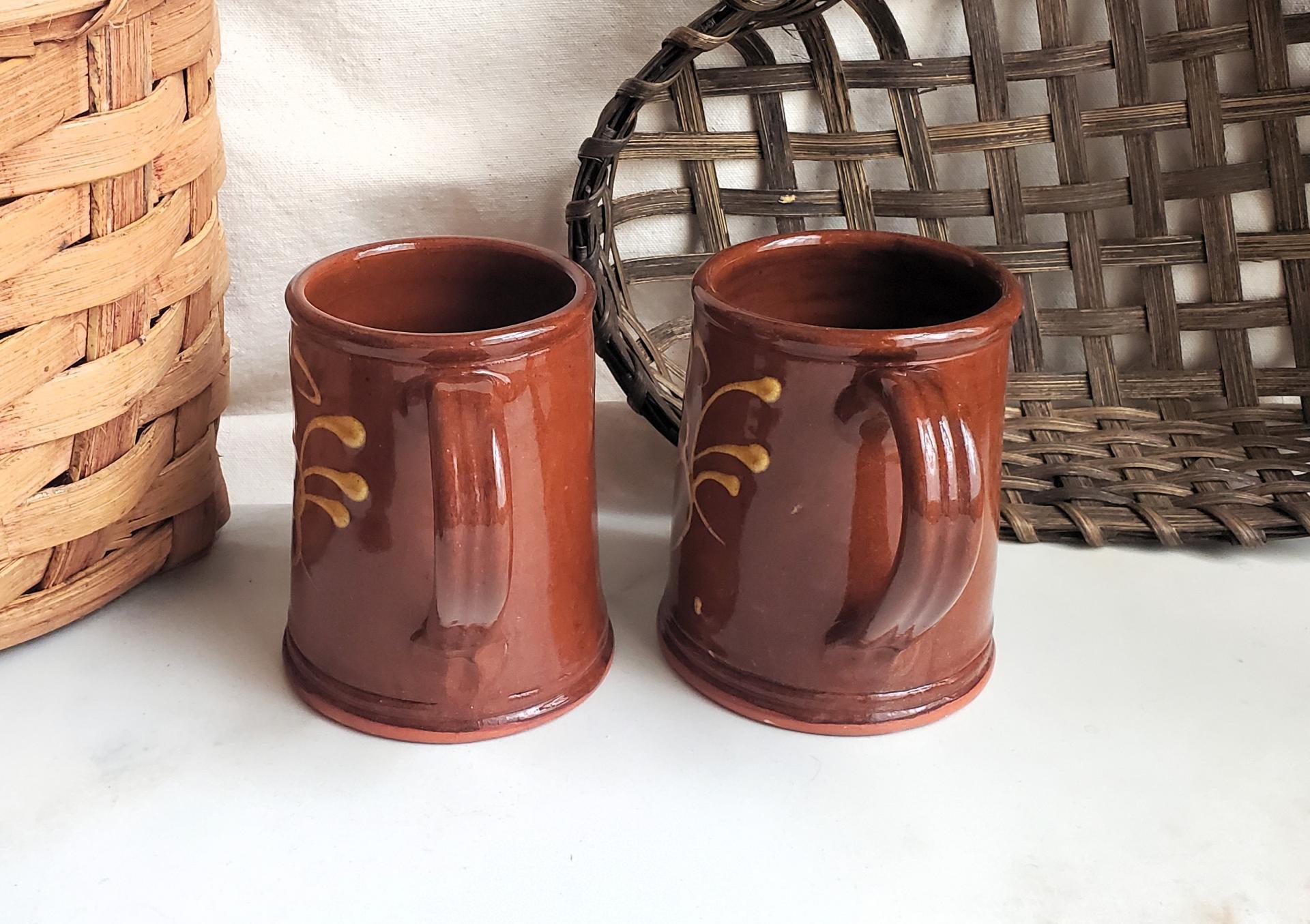 Two Slip-Decorated Redware Mugs with Feather Motif (a)