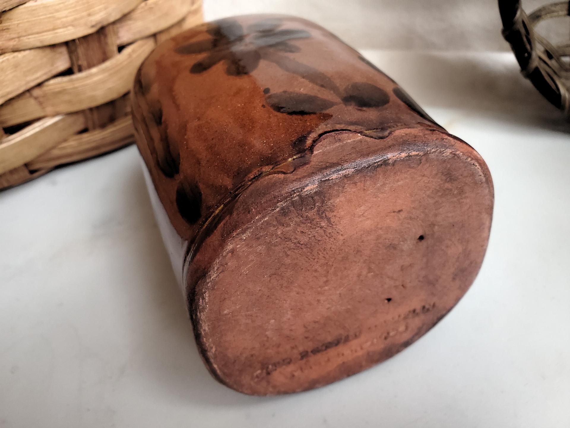 Redware Bottle and Stopper with Black Floral Motif and Square Bottom