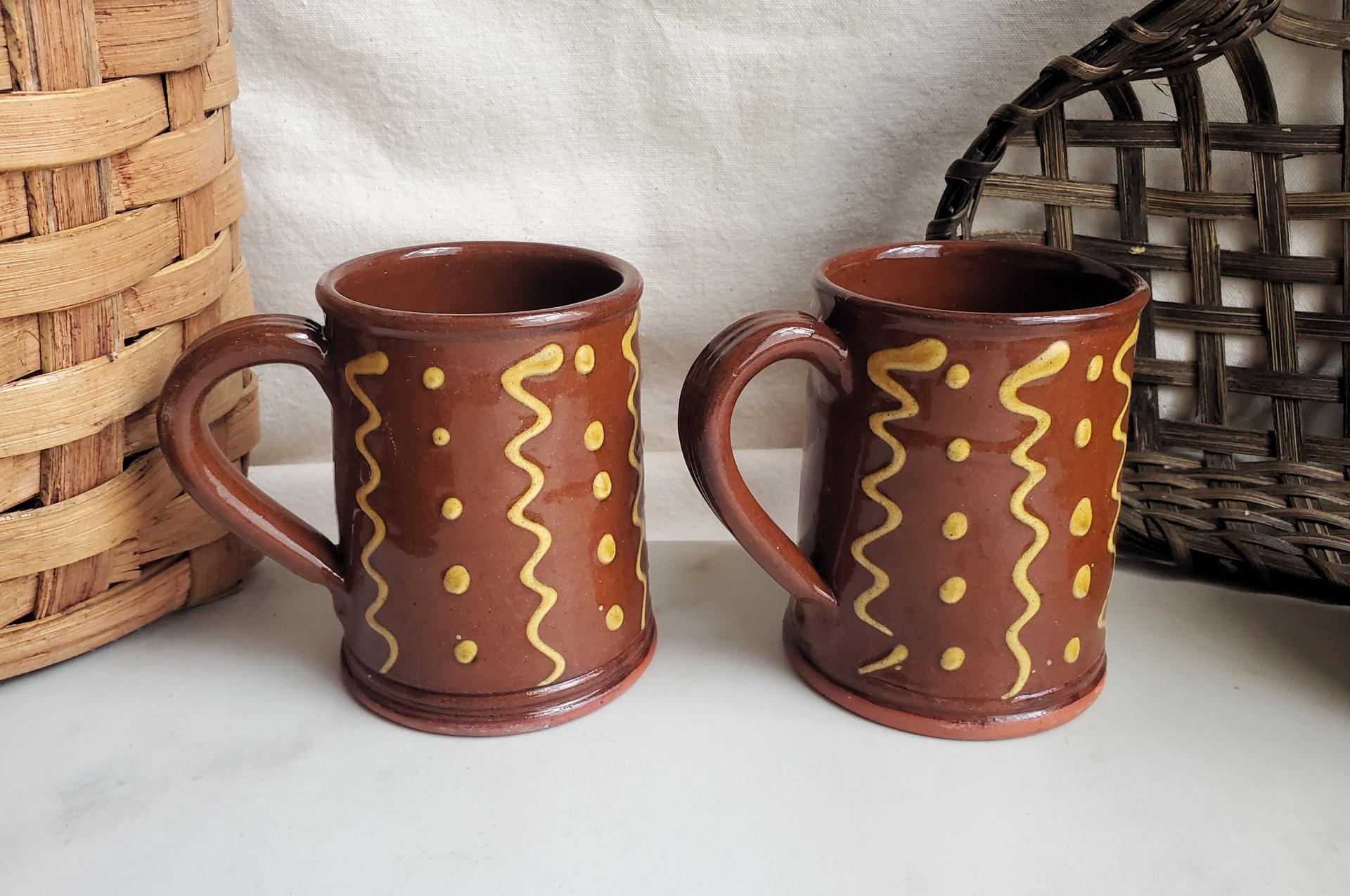 Two Slip-Decorated Redware Mugs with Squiggles and Dots Pattern (a)