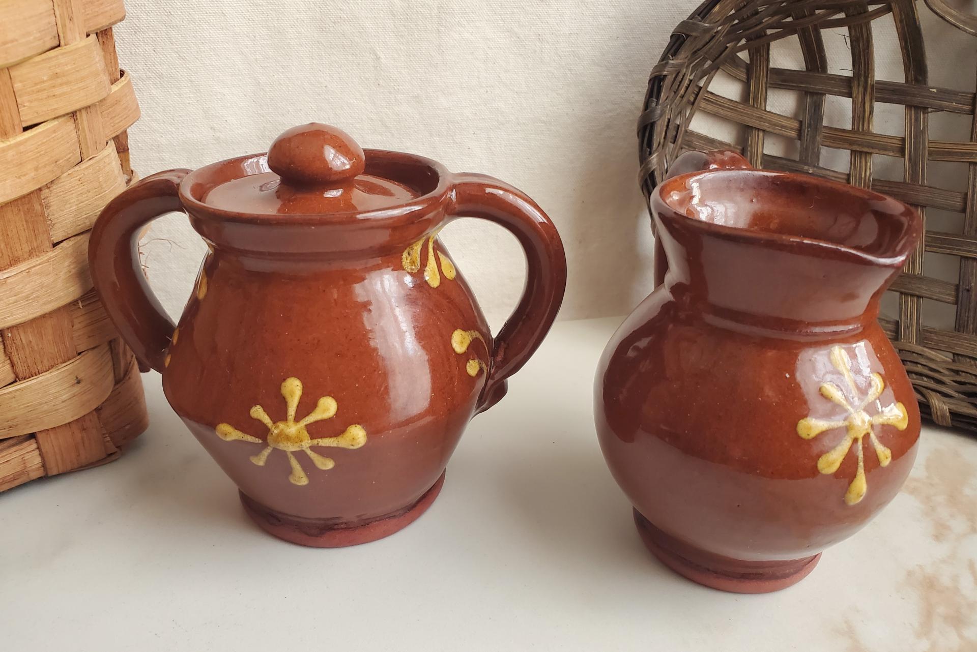 Redware Sugar and Creamer Set with Slip Motif