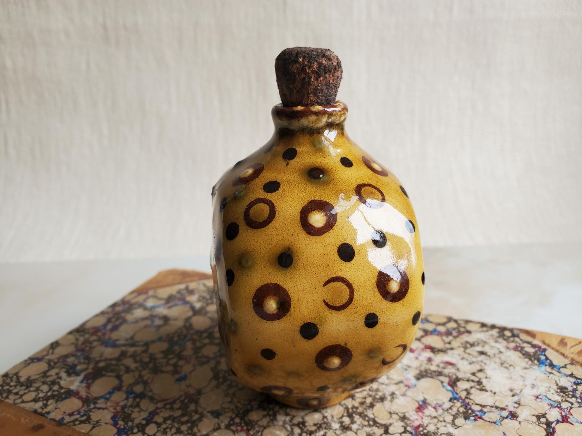 Redware Bottle with Stamped Decoration and Lead-Free Glaze