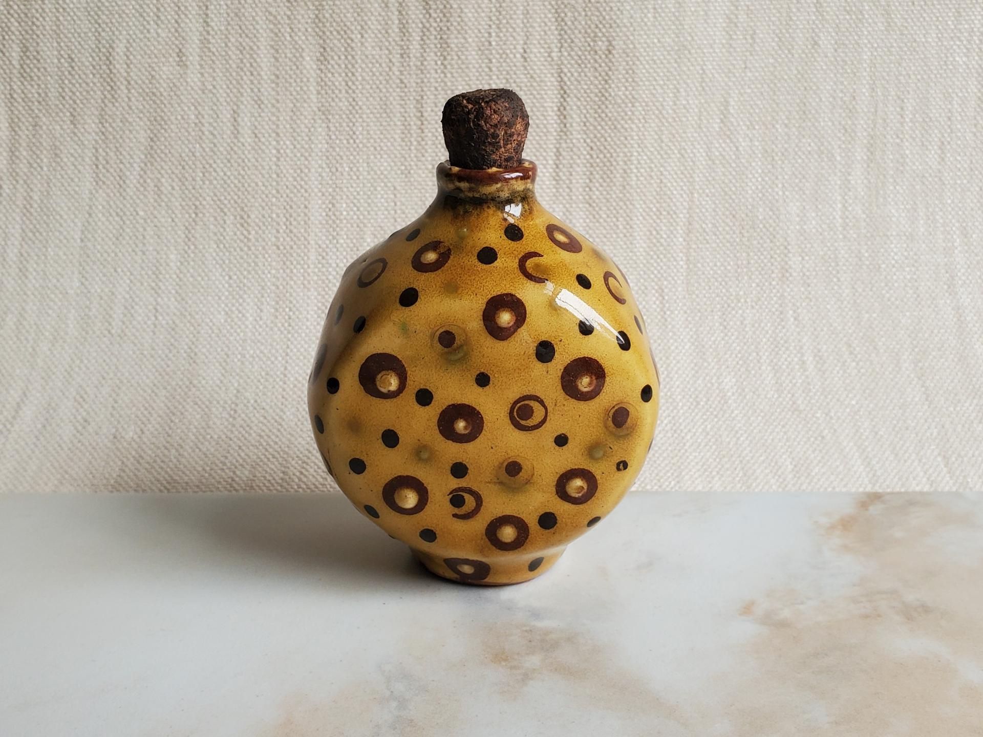 Redware Bottle with Stamped Decoration and Lead-Free Glaze