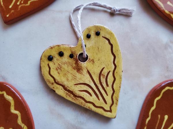 Set of Three Heart-Shaped Redware Ornaments by Garine of Kulina Folk Art, Slip Decorated