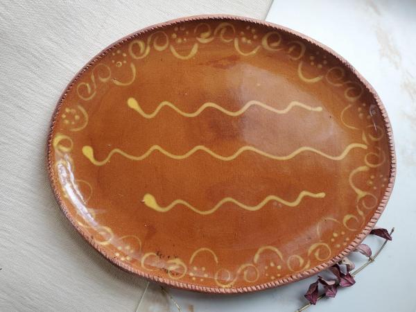 Redware Oval Platter with "Wave" Motif, Pied Potter Hamelin