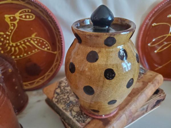 Redware 5 in Storage Jar with Black Dots and Acorn Finial