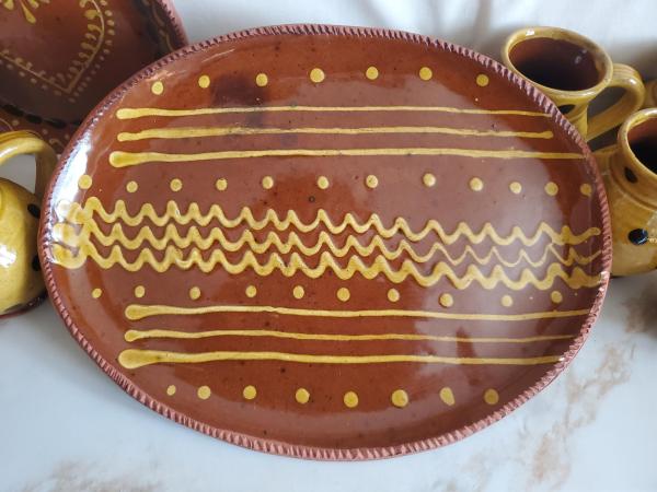 Oval Redware Platter with Traditional Slip Pattern