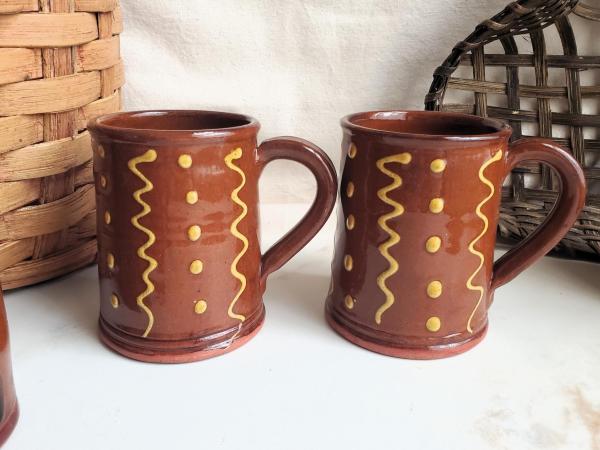 Two Slip-Decorated Redware Mugs with Squiggles and Dots Pattern (a)